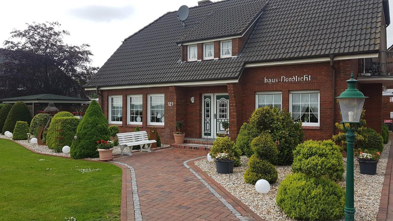 Hausnordlicht Fewo 1 Dornum Esterno foto